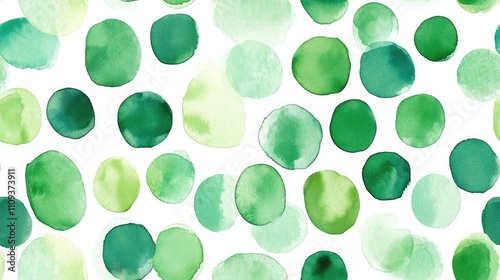 Seamless watercolor pattern featuring malachite green dots ideal for fabric design and jungle themed decor photo