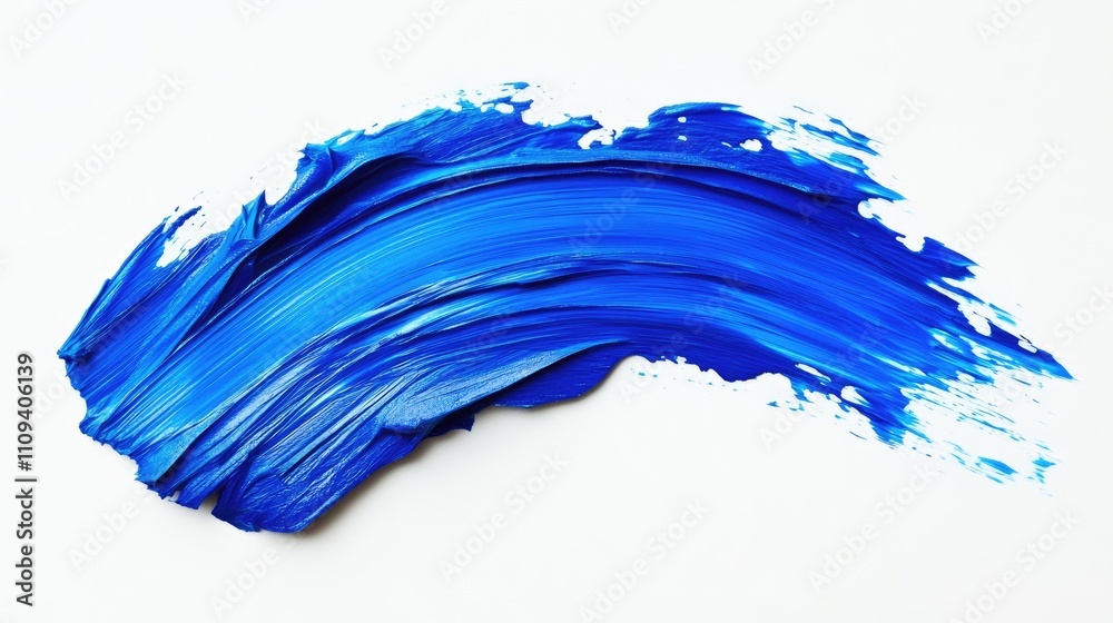 Fototapeta premium A vibrant blue paint stroke showcasing smooth textures and dynamic movement.
