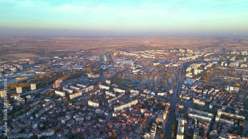custom made wallpaper toronto digitalAerial drone footage of a sunset over the city of Plovdiv in Bulgaria. Ancient city of Filipopolis filmed from above on a warm autumn afternoon. European city seen from a helicopter establishing shot.