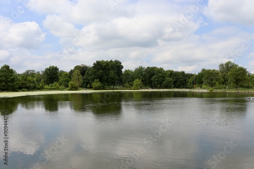 The peaceful lake in the country on a sunny day.
