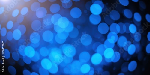 Abstract Blue Bokeh Background with Subtle Light Flare and a Gradual Darkening Effect