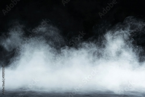 A swirling mist of smoke against a dark background.