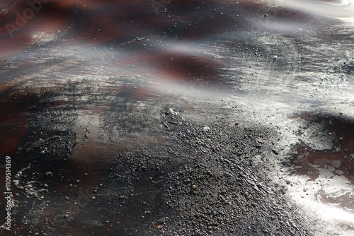Abstract Image of Polluted Water Surface with Oily Patterns