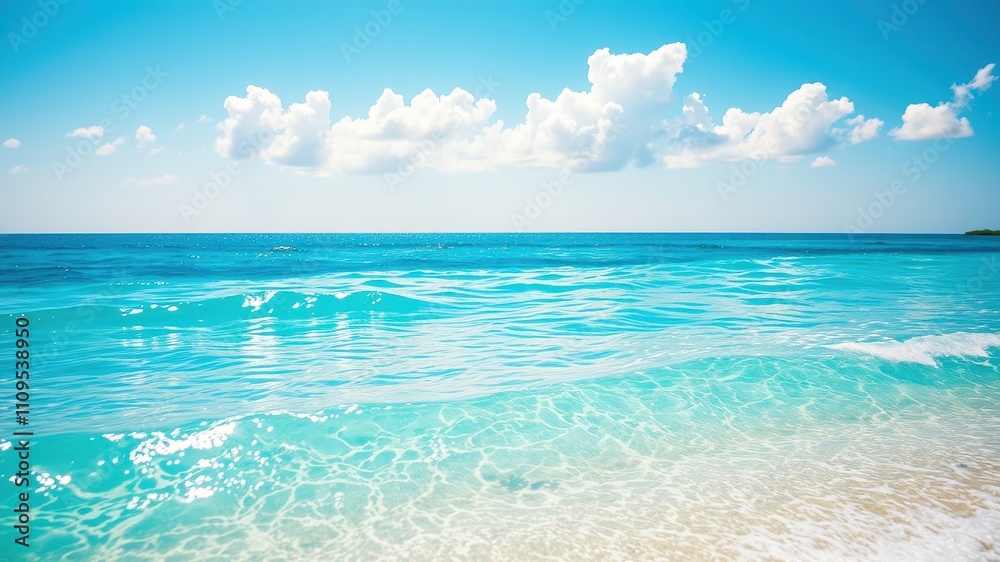 A tranquil seascape with gentle waves breaking on a pristine sandy beach under a sky filled with fluffy white clouds. A tranquil seascape with gentle waves breaking on a pristine sandy beach under a sky filled with fluffy white clouds.