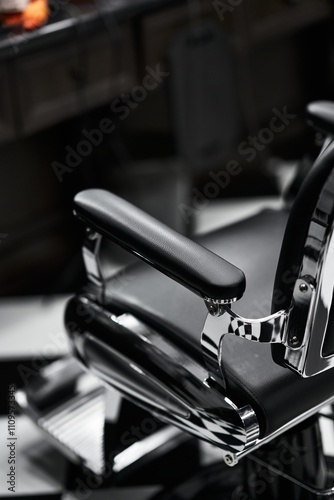 Classic barber chair in a vintage barbershop with black and white decor
