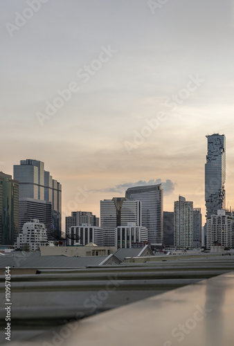 Architecture exterior view of King Power Mahanakhon Building is a mixed-use skyscraper with other modern high-rise buildings.