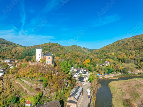 Aerial view of Kreuzberg castle in Altenahr Germany with Baroque palace, medieval round keep above a river photo