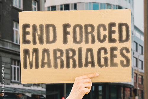The phrase 'End forced marriages' on a banner held by a person. Promoting freedom of choice. Freedom. Rights. Equality. Consent. Justice. Empowerment. Protection