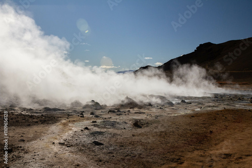 A powerful eruption from a geyser at Geyser Park in Iceland, showcasing geothermal energy, ecology,