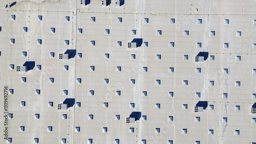 Close-up rooftop AC units air conditioners RTU on top of large grocery store in Texas, commercial packaged on flat roof, HVAC conditioning cooling, dehumidifying, heating, heat pump, air handlers photo