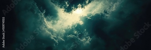 Moody Clouds Over a Dramatic Dark Sky. Stormy Cloudscape for Banner Design with Expansive Copy Space