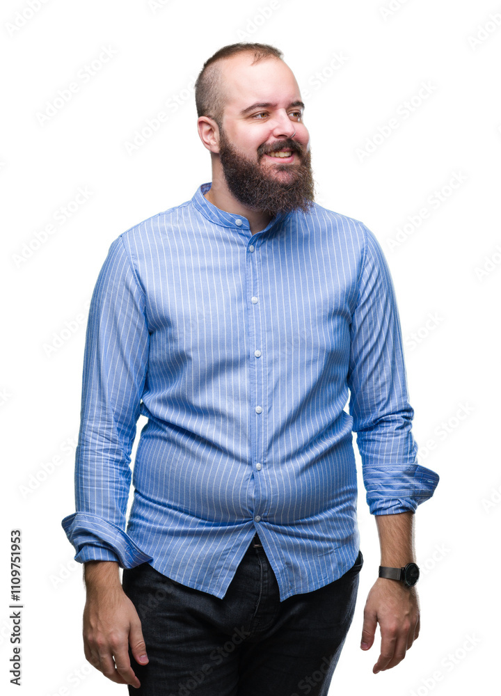 Young caucasian hipster man over isolated background looking away to side with smile on face, natural expression. Laughing confident. Young caucasian hipster man over isolated background looking away to side with smile on face, natural expression. Laughing confident.