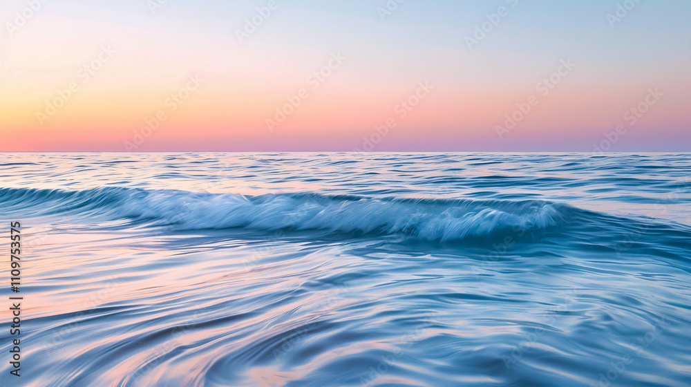 Fototapeta premium Sunrise Reflected in Ocean: The soft pastel hues of a sunrise reflected in calm ocean waters, creating a serene and picturesque morning scene.