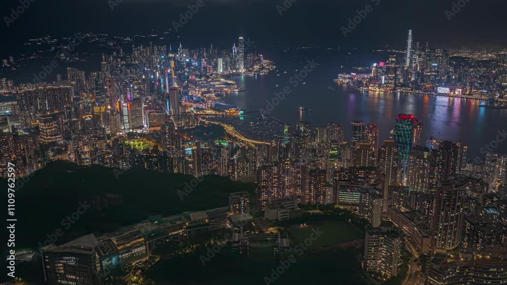 4K aerial time-lapse video capturing Victoria Harbour in Hong Kong at night