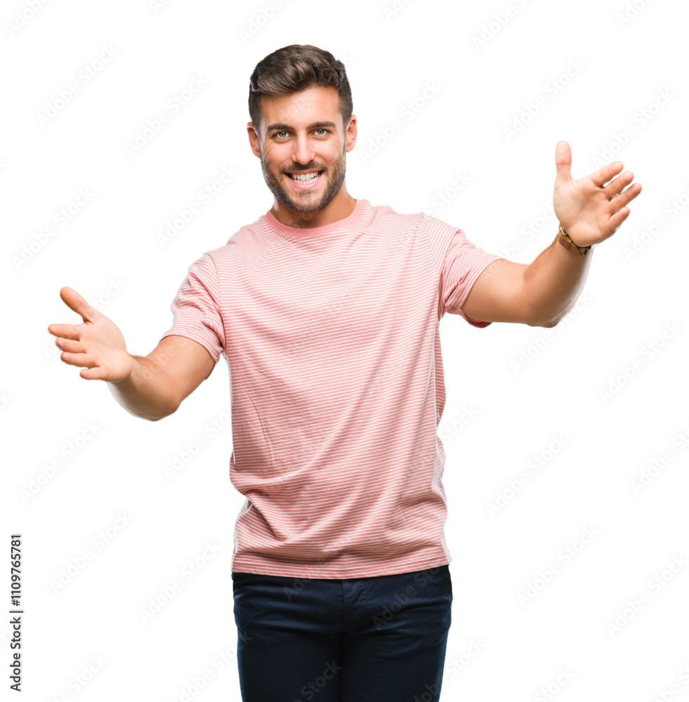 Young handsome man over isolated background looking at the camera smiling with open arms for hug. Cheerful expression embracing happiness. Young handsome man over isolated background looking at the camera smiling with open arms for hug. Cheerful expression embracing happiness.
