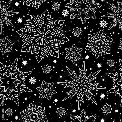 Abstract flying white painted snowflakes on black background