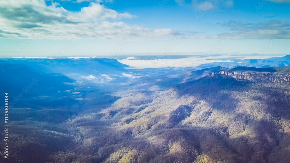 Fototapeta premium The Blue Mountains are a mountainous region and a mountain range located in New South Wales, Australia. The region is considered to be part of the western outskirts of the Greater Sydney area. 