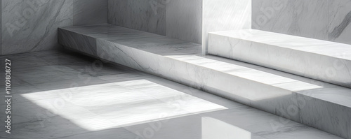 Minimalist marble interior with natural light and shadows.