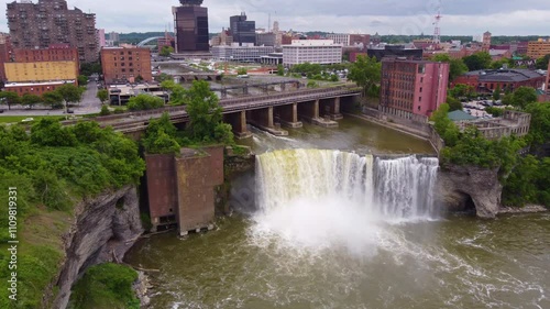 Experience the majestic beauty of Rochester, NY, with this captivating aerial drone footage. The clip features a stunning flight over High Falls and the city skyline.