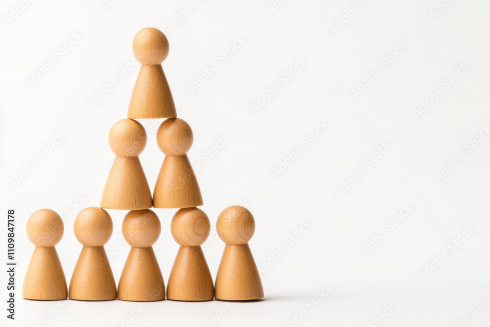 Building pyramid of wooden figures symbolizes teamwork and collaboration. This arrangement highlights unity and support among individuals Building pyramid of wooden figures symbolizes teamwork and collaboration. This arrangement highlights unity and support among individuals