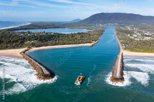 Tableau sur toile Aerial View North Haven - NSW Australia - Construction Barge leaving the Camden