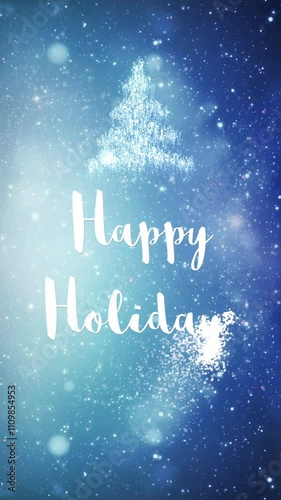 Vertical Happy Holidays Particle Glitter Snow 4K Loop features a blue atmosphere with glittering and sparkling particles floating and Happy Holidays and particle tree in a vertical ratio loop.