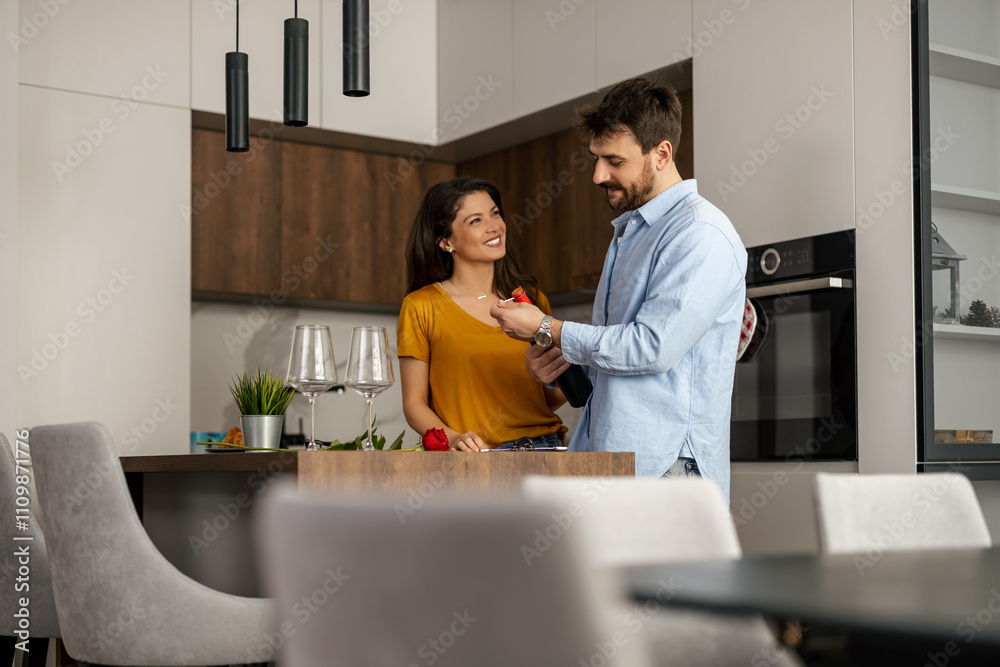 Romantic Couple Enjoying a Special Moment in Their Kitchen Romantic Couple Enjoying a Special Moment in Their Kitchen