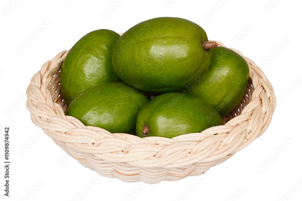 Fresh kedondong or ambarella fruit in a woven bamboo container isolated transparent Fresh kedondong or ambarella fruit in a woven bamboo container isolated transparent
