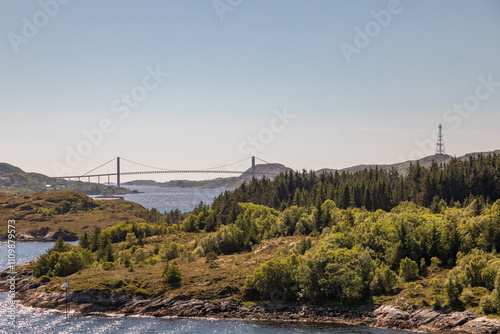 The Span of the Nærøysund Bridge across Nærøysundet strait in northern Norway on a Perfect Midsummer Day photo