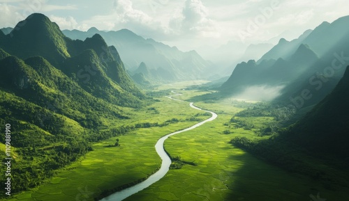 Aerial view of the winding Dian River flowing through lush green rice fields with towering mountains in the backdrop photo