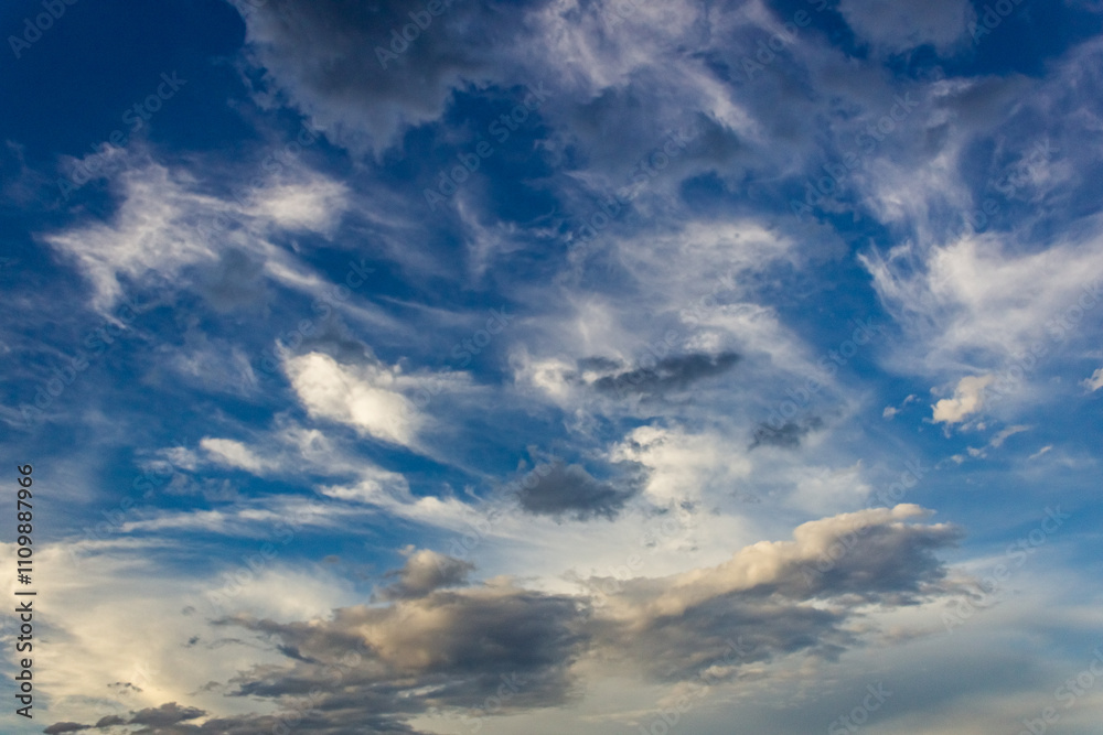 Dramatic sky with dark clouds at sunset, natural background. Dramatic sky with dark clouds at sunset, natural background.