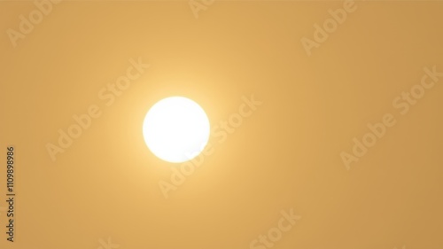 Wallpaper Mural A bright white sun shines through a pale golden sky, radiating warmth and light. Torontodigital.ca