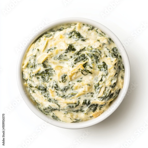 A bowl of creamy spinach and artichoke dip with a golden, bubbly top layer, isolated white background