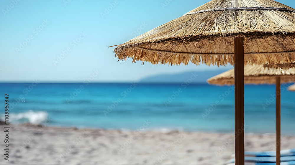 straw umbrellas on the beach with the Mediterranean sea in the back
straw umbrellas on the beach with the Mediterranean sea in the back