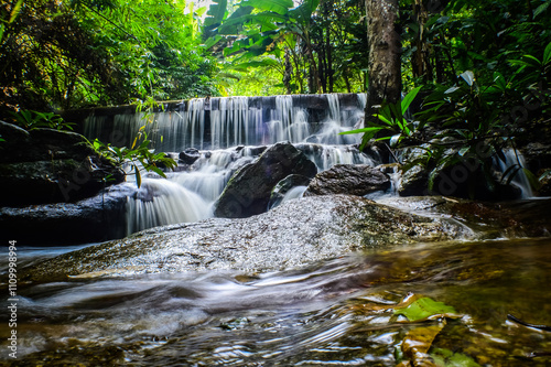 Beautiful Small Waterfall in Green Forest in jungle at Pha Lat Temple (Sakithaka),Chiang Mai, Northern Thailand photo