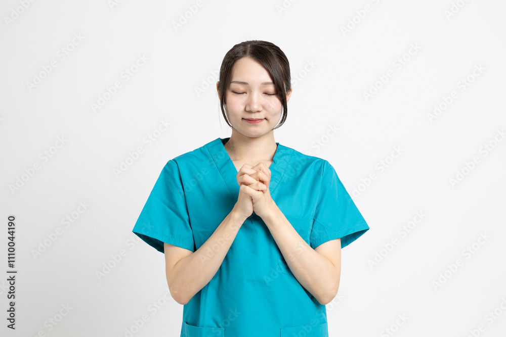 手術着を着た女性の医者 手術着を着た女性の医者