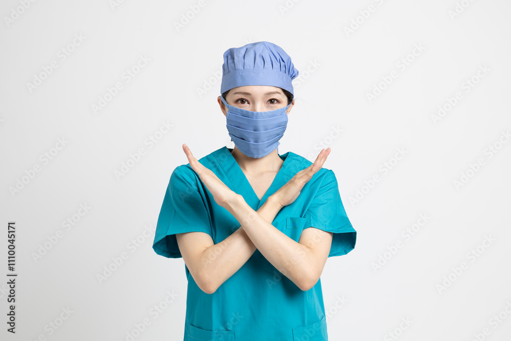 手術着を着た女性の医者 手術着を着た女性の医者