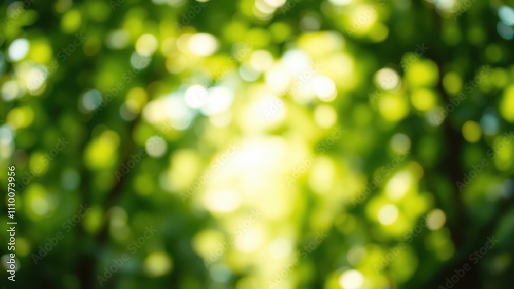 Obraz premium Abstract Background of Defocused Green Leaves and Sunlight