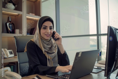 Beautiful Arab businesswoman working in office