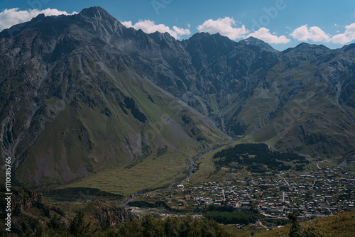 Mountain view. Mountain landscape in Georgia, at the foot of the mountain the village of Stepantsminda and Kazbegi photo