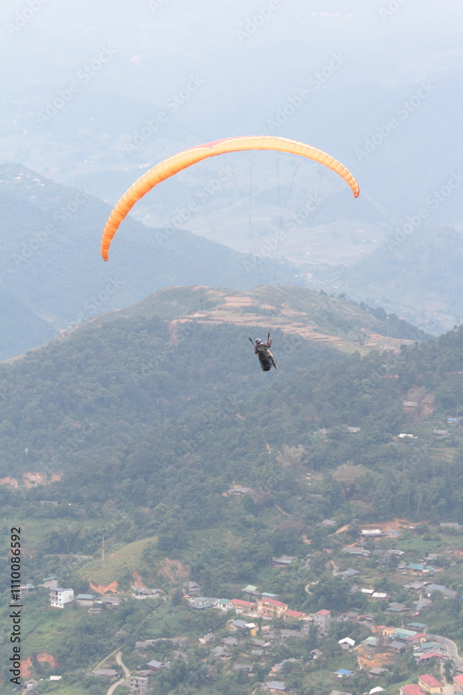 A parachute on the mountain range in Northern Vietnam. A parachute on the mountain range in Northern Vietnam.