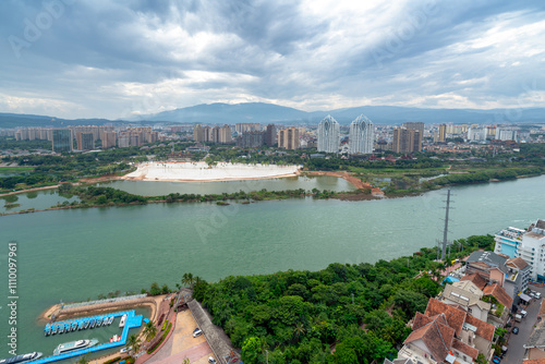 Lancang River and buildings on both sides, cityscape of Xishuangbanna, Yunnan, China. photo