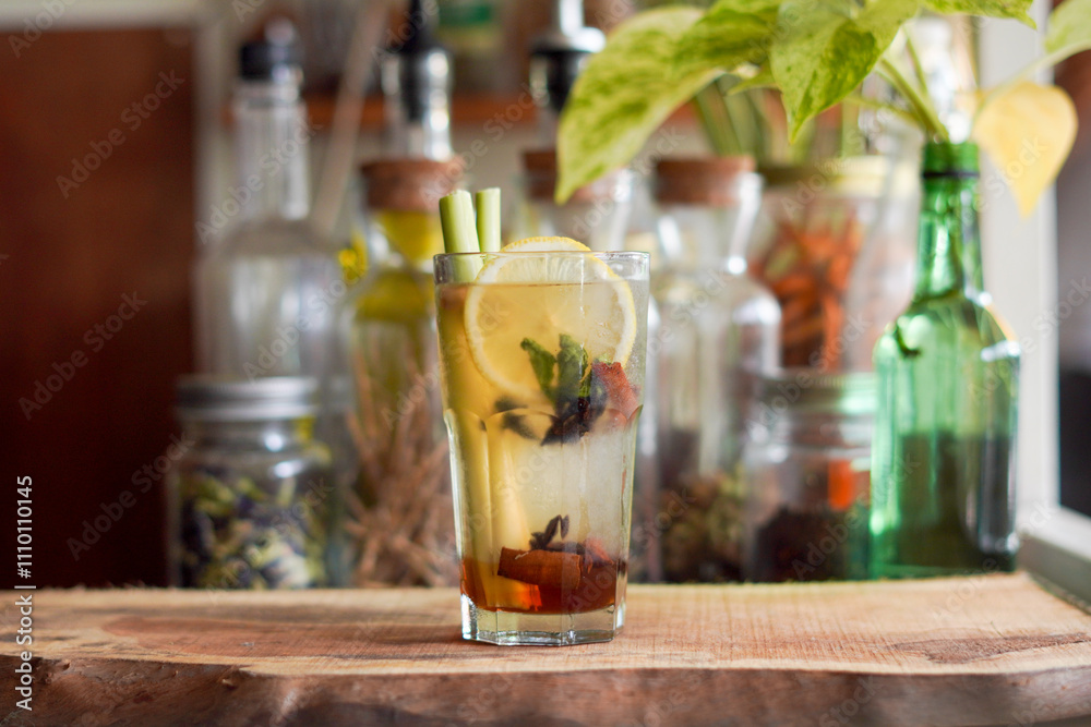 a Glass of Spices Herbal Drink Served on the Wooden Table a Glass of Spices Herbal Drink Served on the Wooden Table