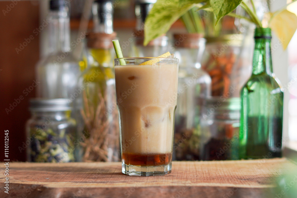a Glass of Spices Herbal Drink Served on the Wooden Table a Glass of Spices Herbal Drink Served on the Wooden Table