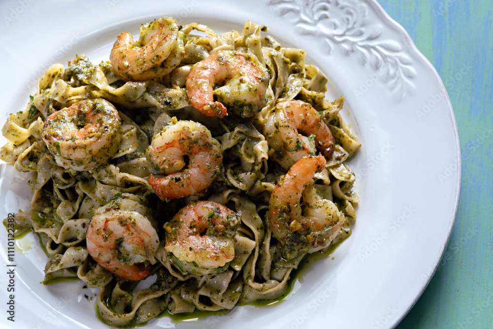 seafood pasta in pesto sauce