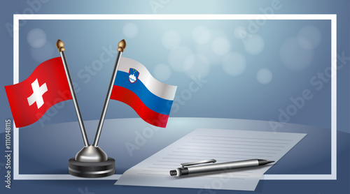 Switzerland and Slovenia Small national flag on bokeh background, cooperative relationship
