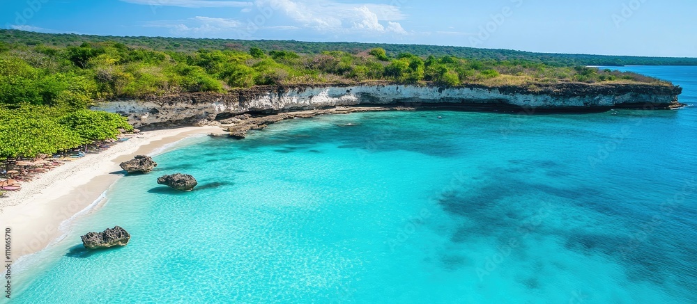 Aerial view of a tropical sandy bay with rocky cliffs and clear turquoise waters under a bright blue sky Aerial view of a tropical sandy bay with rocky cliffs and clear turquoise waters under a bright blue sky
