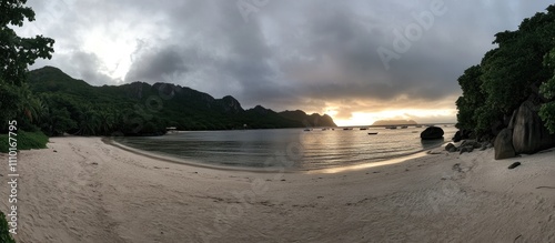 Anse Source D Argent breathtaking panorama of pristine beach at sunset surrounded by lush tropical landscape and calm ocean waves photo