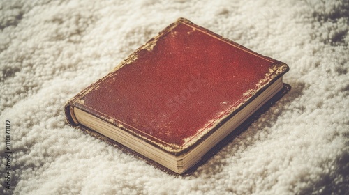 Vintage leather-bound diary on a textured white surface showcasing business accessories and stationery concept for creative projects. photo