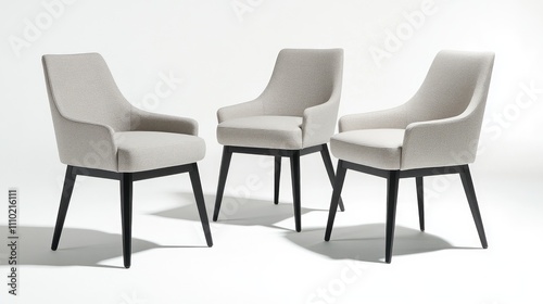 Stylish modern dining chairs on sleek black legs designed for contemporary kitchen or restaurant interiors with white backdrop